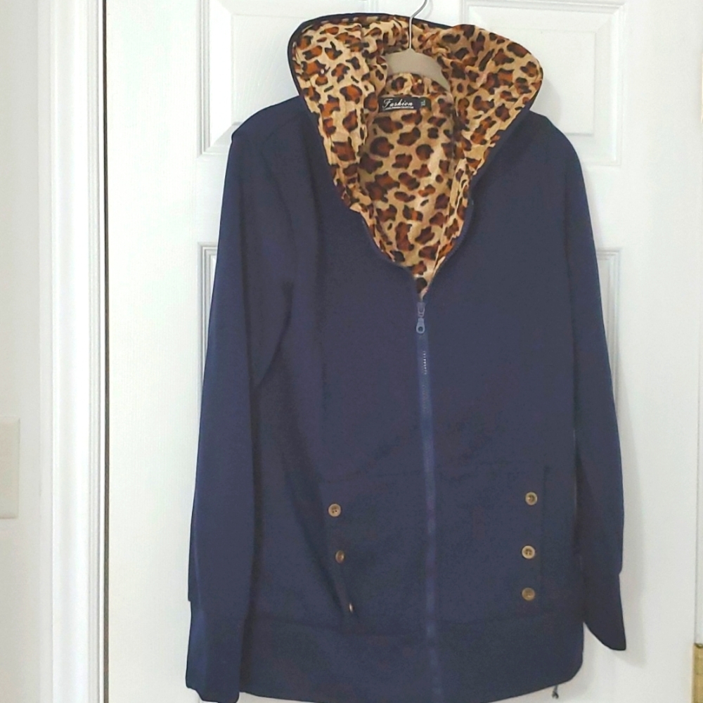 Fleece jacket with leopard print insert.